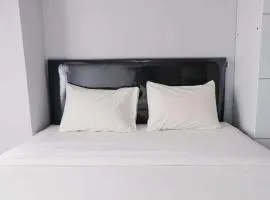 Homey 1BR Apartment at Newton Residence Bandung By Travelio