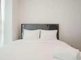 Nice and Homey 1BR at Citralake Suites Apartment By Travelio