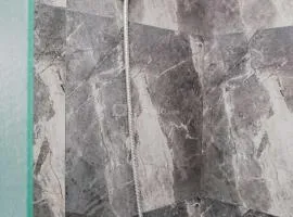 Minimalist and Cozy Studio Apartment at Tuscany Residences By Travelio