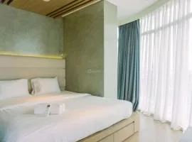 Spacious and Homey 2BR at Tree Park City Cikokol Apartment By Travelio
