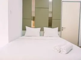 Modern and Homey 2BR Apartment at M-Town Residence By Travelio