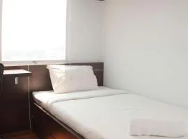 Homey and Minimalist 2BR at Patraland Urbano Apartment By Travelio