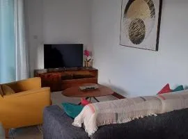 Appartement NANA A 34 - Appartement Cosy et Lumineux - Vue Panoramique- Centre ville- - Cuisine équipée- CLIM- WIFI - NETFLIX-Parking Public Gratuit-Garage privé payant