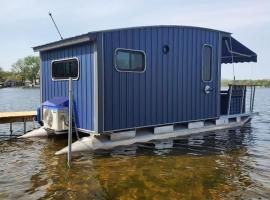 House boat on Fife Lake, boot in Fife Lake