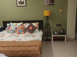Riverside Palm Deluxe Double Room with AC in a house near Kamakhya and IHR