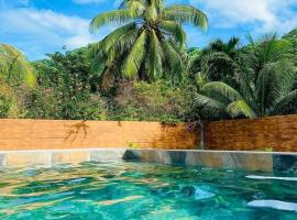 Maison du bonheur Moorea, hotel a Vairoa