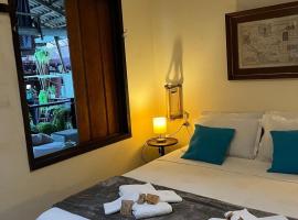 Suíte Praia Do Rosa, Casa na Ilha、パラチのホテル