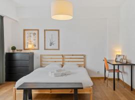 Central Lux 2BR Apt with City Views & Balcony