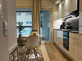 Viihtyisä kaupunkiyksiö saunalla โรงแรมในปอรี