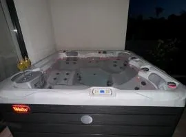 New luxury air-conditioned apartment, with jacuzzi, free parking and gardens