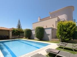 Christina Villas, Steps to Sandy Beach, By ThinkVilla – hotel w mieście Sfakaki