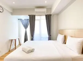 Spacious and Combined 1BR Vasanta Innopark Apartment By Travelio