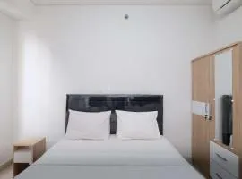 Fully Furnished and Cozy 2BR at Transpark Cibubur Apartment By Travelio