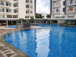 Modern and Strategic 2BR Casa De Parco Apartment near ICE BSD By Travelio
