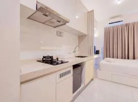 Comfy Designed and Modern Studio at Sky House BSD Apartment By Travelio