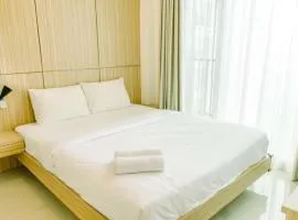 Comfort and Minimalist 1BR at Tree Park City BSD Apartment By Travelio