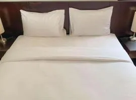 Comfort and Minimalist 2BR at Maple Park Sunter Apartment By Travelio