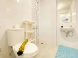 Homey Living 2BR at Tokyo Riverside PIK 2 Apartment By Travelio