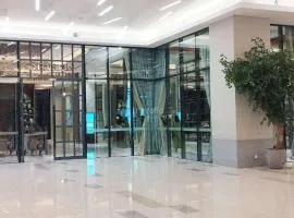 Modern and Cozy Studio at Benson Supermall Mansion Apartment By Travelio