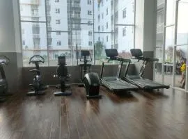 Homey and Comfy 2BR Apartment at Suncity Residence By Travelio