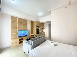 Comfort and Simply Design Studio at Vasanta Innopark Apartment By Travelio