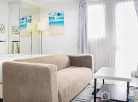 Nice and Comfort Studio Room at Azalea Suites Apartment By Travelio