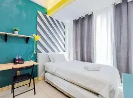 Minimalist Studio at Tree Park City BSD Apartment By Travelio