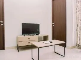Comfort and Homey 2BR at Transpark Bintaro Apartment By Travelio