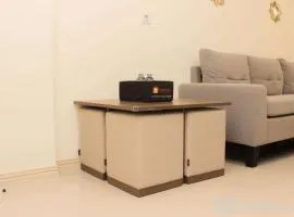 Warm and Cozy Living 3BR at Meikarta Apartment By Travelio