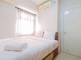 Modern and Homey 2BR at Green Pramuka City Apartment By Travelio