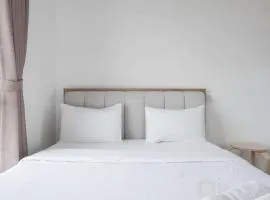 Homey and High Floor 2BR at Sky House BSD Apartment By Travelio