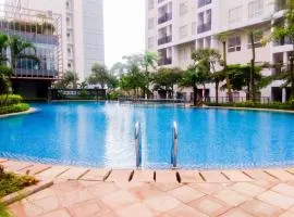 Modern Look 1BR Apartment at Scientia Residence By Travelio