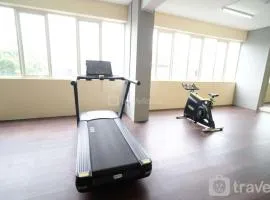 Cozy Living and Tidy 2BR at Puncak Dharmahusada Apartment By Travelio