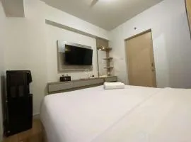 Comfort and Cozy Stay 1BR at The Alton Apartment By Travelio