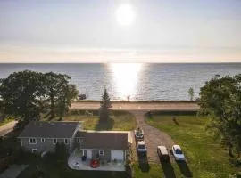 Modern Home on Mille Lacs Lake! Amazing yard and game-room!