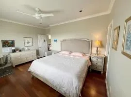 A cozy bedroom with a private washroom close to YVR Richmond