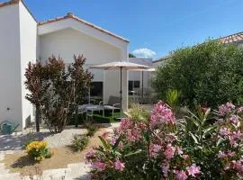 La petite maison zone coulée verte menant a l'océan