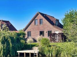 Ferienhaus Fehnglück, Hotel in Ihlow