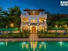 StayVista's Ashwamedha Manor - Mountain-Side Luxury Retreat with Outdoor Pool, Jacuzzi, Spa & Steam Room, and Indoor Activities