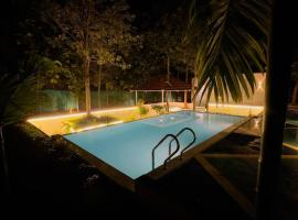 Serenity Farm Stay, hotel v destinaci Hampāpura