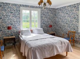 Trädgårdshotellet Årås Säteri och Trädgårdar, hotell i Dalum