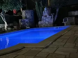Villa con piscina "Pumo"