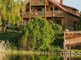 Agroturystyka nad jeziorem-Herrmann hof, hotell i Dejguny