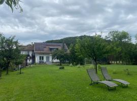 Pensiunea Sovirag, hotel na praia em Praid