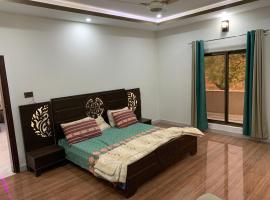 Naqvi's Residency, casa rústica em Muzaffarabad