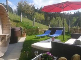 Privater Whirlpool & Sauna - Wellness Oase, hotel with hot tubs in Rüeggisberg