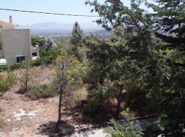 Ferienwohnung zwischen City Athen Strand und Flughafen in den Bergen, ξενοδοχείο στο Ντράφι