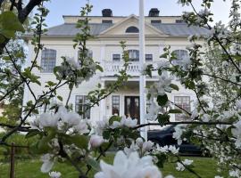 Lägenhet i sekelskifteshus, hotel v destinaci Härnösand
