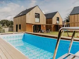 Holiday Home by Lake arnowieckie with Jacuzzi
