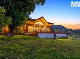 StayVista at Three Shores with Lake View & Alfresco Dining